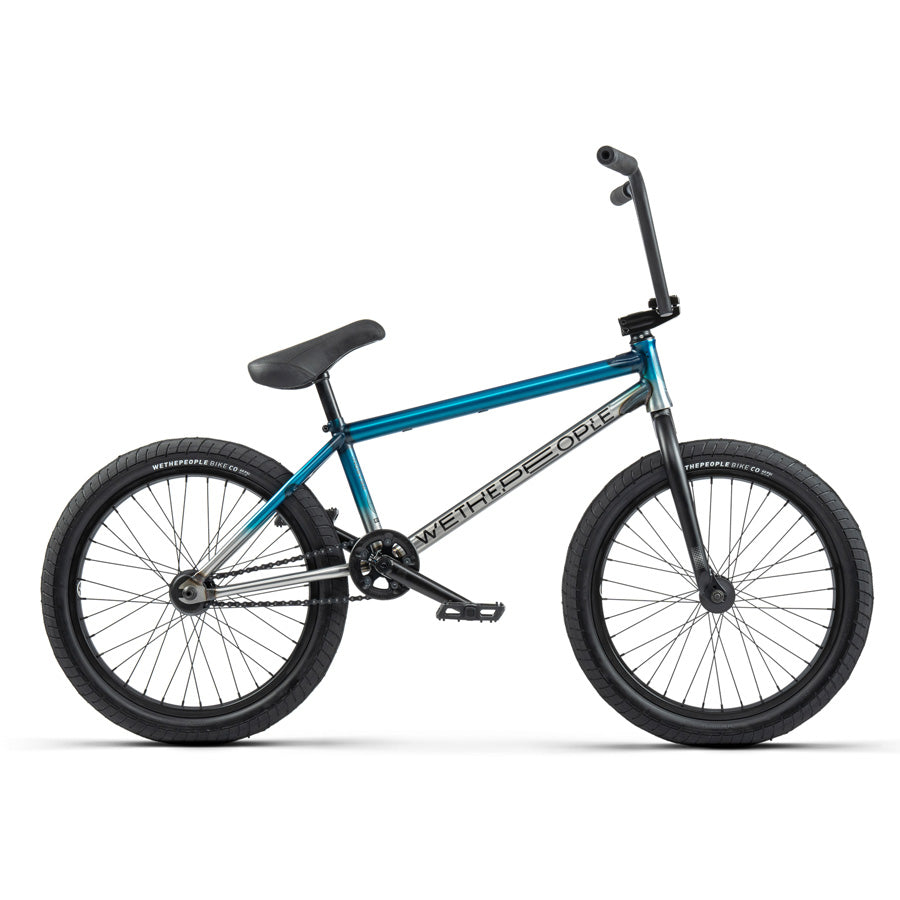 A blue and black Wethepeople Reason 20 Inch BMX Bike on a white background.