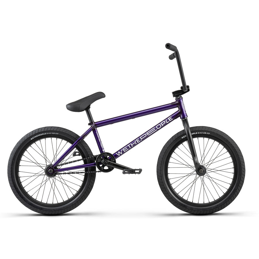 A purple Wethepeople Reason 20 Inch BMX bike on a white background.