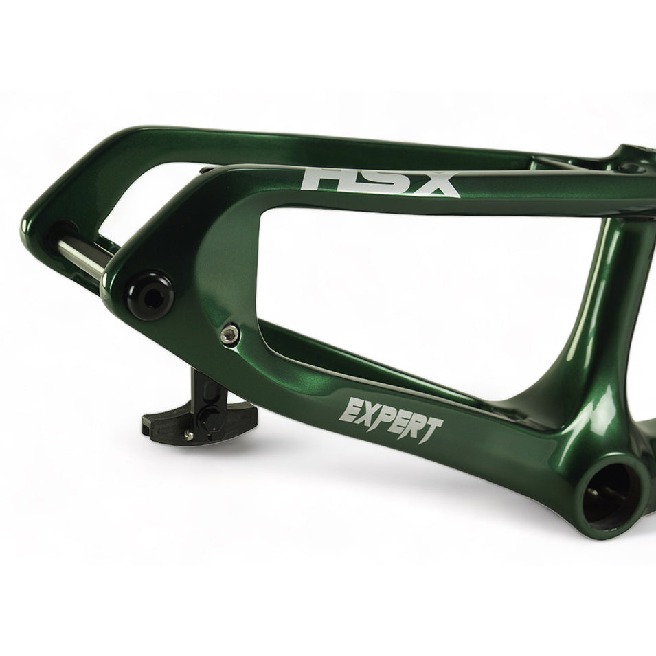 A green Meybo 2024 Carbon HSX Expert frame BMX race frame with the word apsa on it.