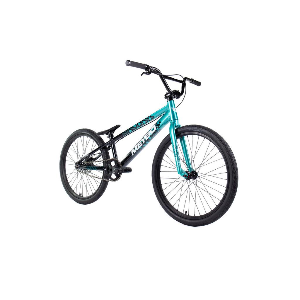 The Meybo 2026 Clipper Pro Cruiser Bike features a lightweight teal and black frame with black handlebars and wheels, shown on a white background—ideal for entry-level BMX racing.