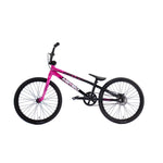 The Meybo 2026 Clipper Expert XL Bike, shown in pink and black with a straight top tube, knobby tires, and black handlebars, is displayed in side view. Ideal as an entry-level BMX race bike for new riders.
