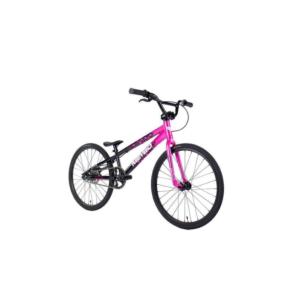 The Meybo 2026 Clipper Junior Bike, shown in pink with black handlebars, seat, and tires on a white background, is an ideal entry-level BMX race bike.