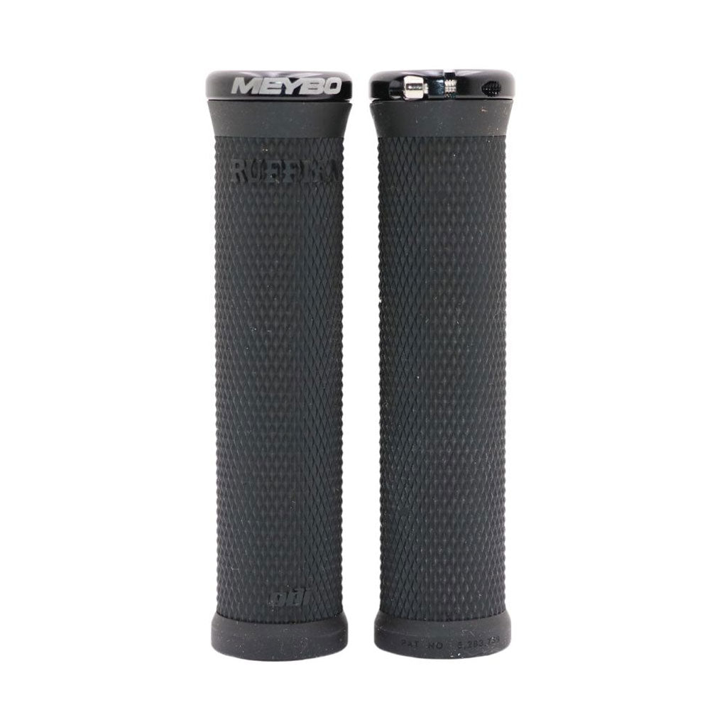 A close up of a handlebar with Meybo ODI Ruffian V2.1 Lock On Grips for enhanced traction.