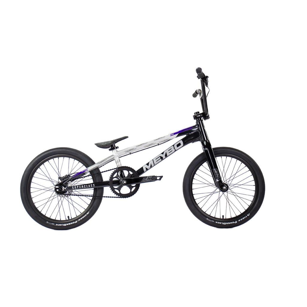 The Meybo 2026 Superclass Pro XXL Bike, a black and silver BMX with a 22” top tube for tall riders, is displayed in profile on a white background.