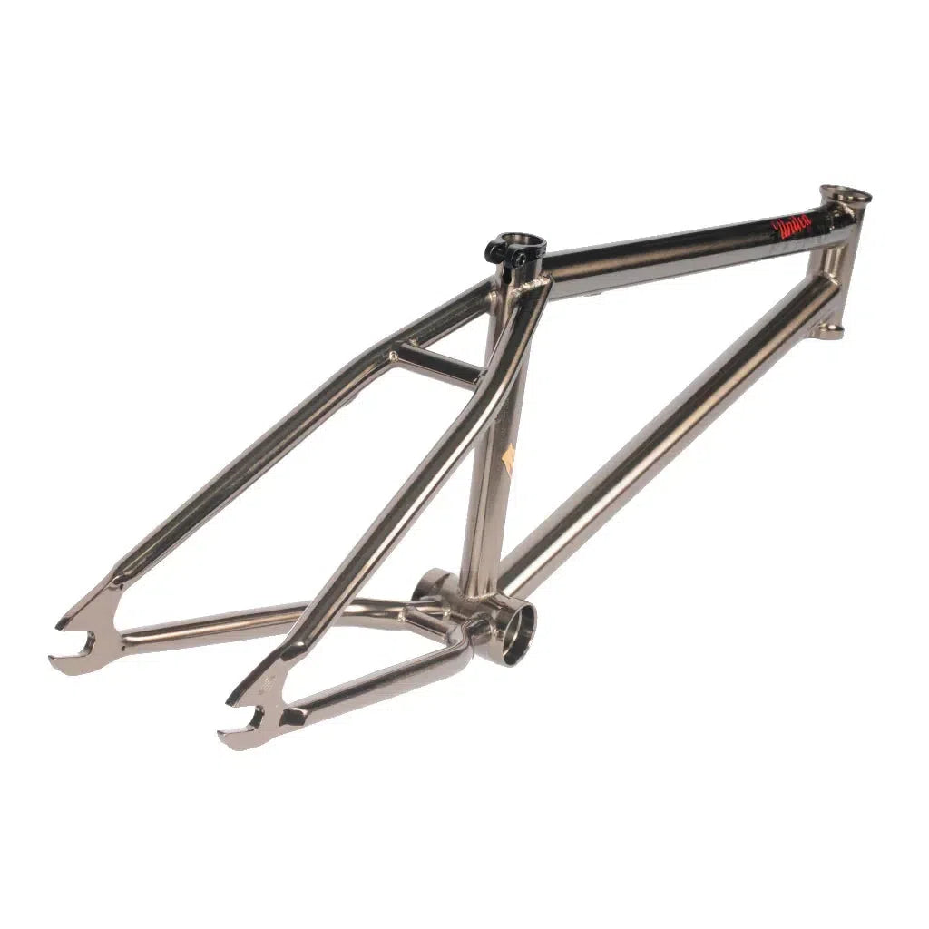 The United Zuin Frame, with a triangular titanium structure and invest cast dropouts, offers a sleek design with mounts for seat and wheels. This Miki Fleck Signature piece is elegantly showcased against a plain white background.