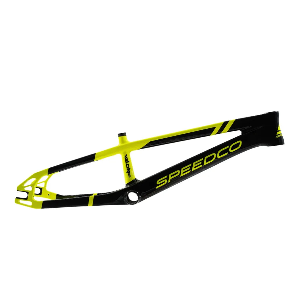 The Speedco Velox EVO Carbon BMX Race Frame Junior, in black and yellow, displays the "Speedco" logo on the lower tube and is crafted from premium Toray T-700 carbon for superior strength and performance.