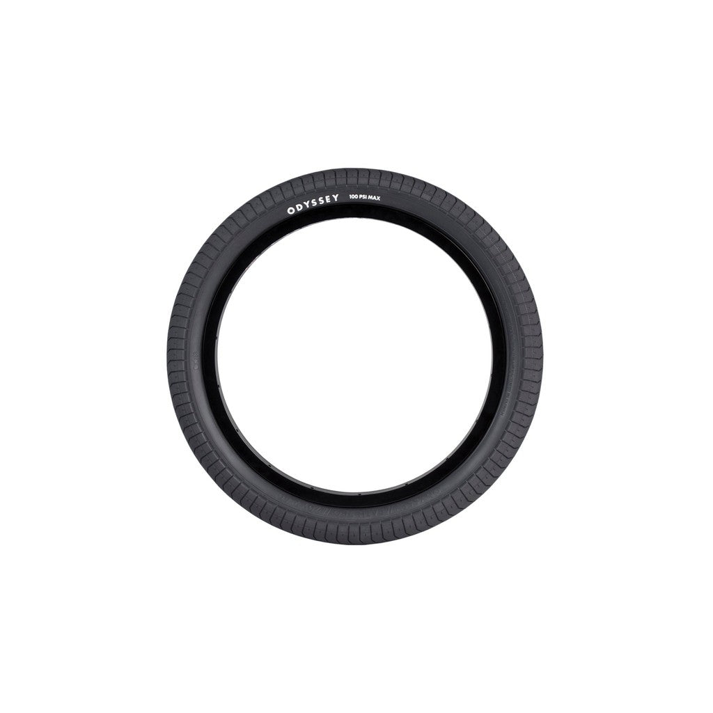 A black Odyssey Path Pro Tyre (Each) isolated on a white background.