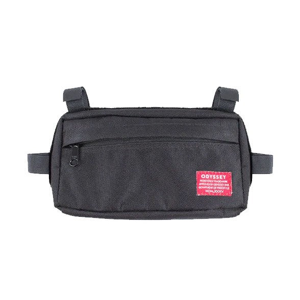 An Odyssey Switch Pack Universal Bag with a red label on it, perfect for carrying essentials.