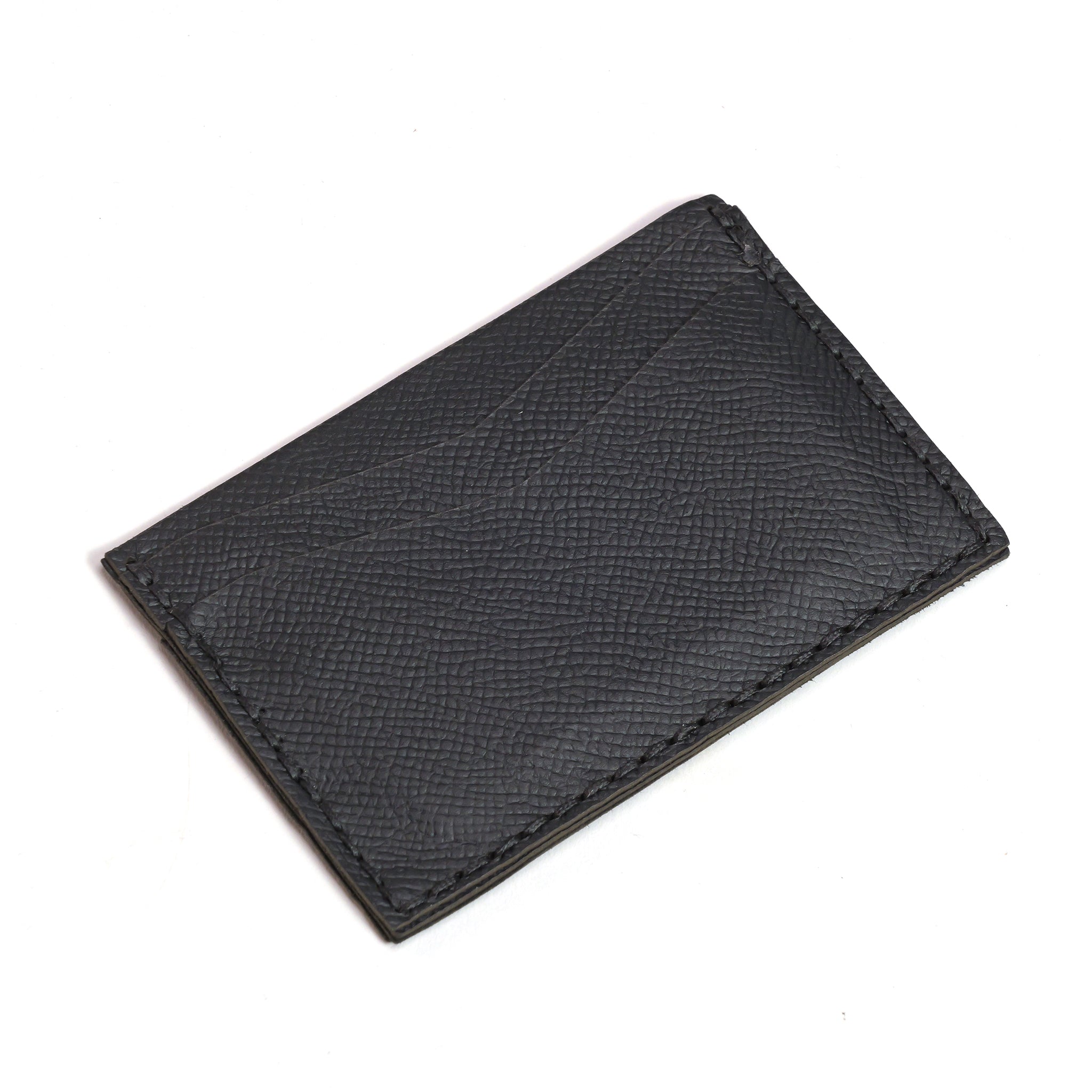 The LUXBMX Leather Card Holder features visible stitching and premium craftsmanship, making it an essential accessory for those who value classic style—displayed elegantly on a white background.