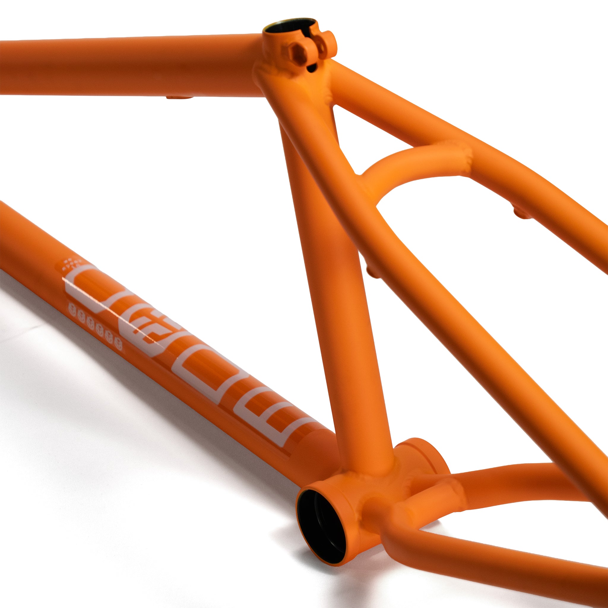 Close-up of a Federal Code Frame BMX in orange with white geometric graphics on the lower tube, photographed against a white background—ideal for street riders who value style and durability.