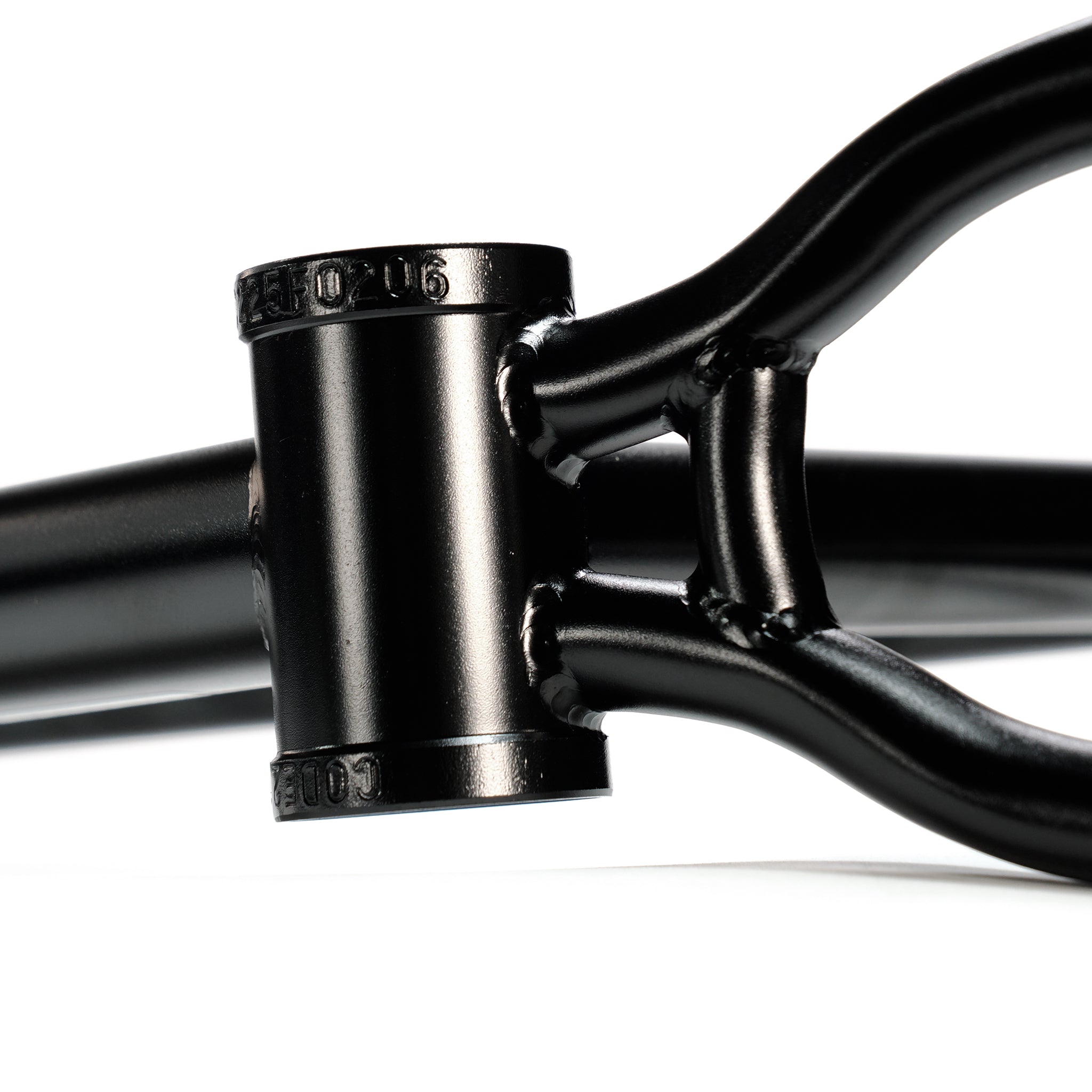 Close-up of the Federal Code Frame's black bottom bracket shell and chainstays against a white background, ideal for street riders needing durability.