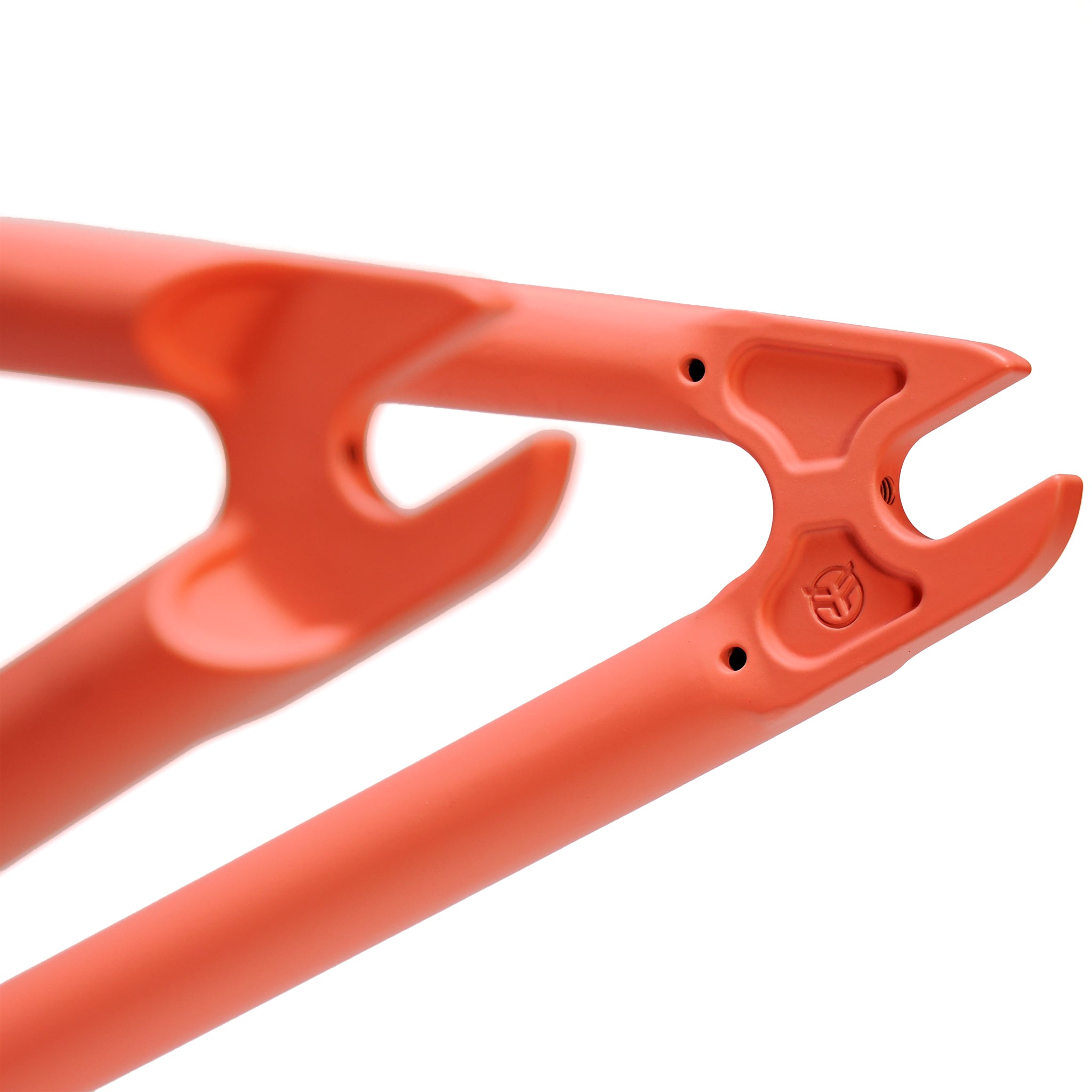 Close-up of the Federal Lacey 3 Frame’s orange dropout, crafted from 4130 Chromoly tubing with a minimalist, angular design and visible mounting holes.