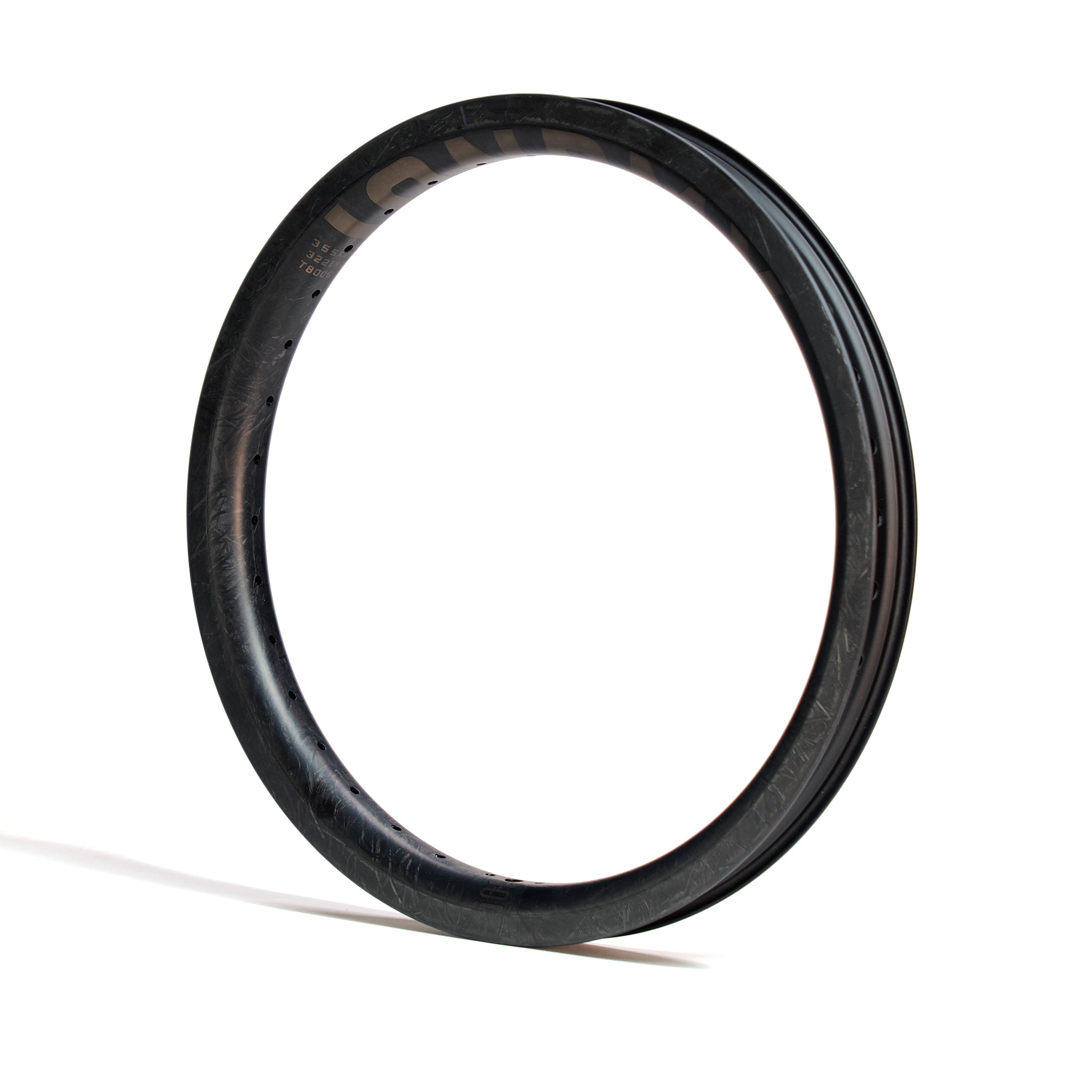 The ION BMX C18 Carbon Fiber 18 Inch Braking Rim is displayed standing vertically against a white background.