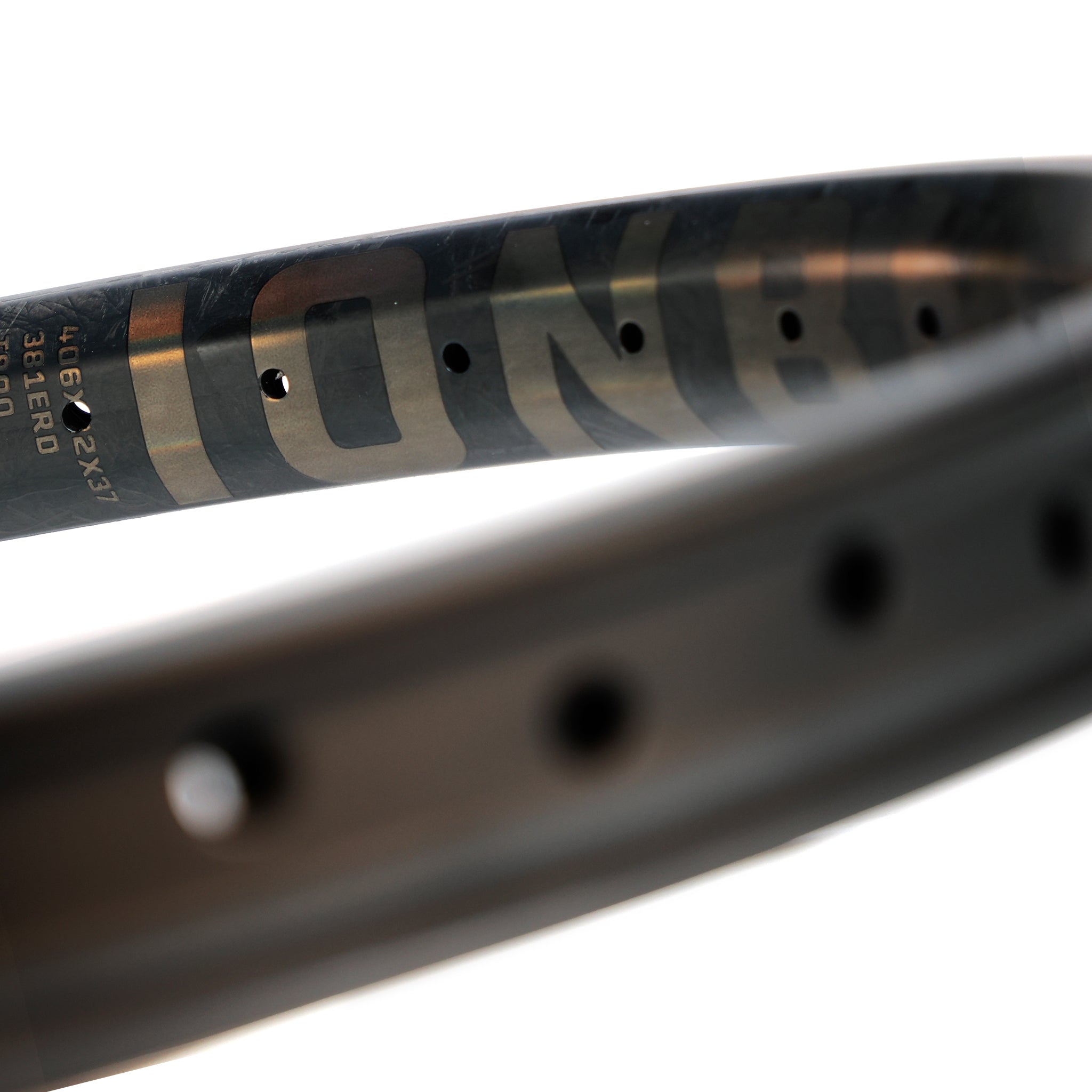 Close-up of the ION BMX C20 Carbon Fiber 20 Inch Braking Rim, featuring ventilation holes and subtle inner branding, crafted from premium Toray T800 carbon fiber.