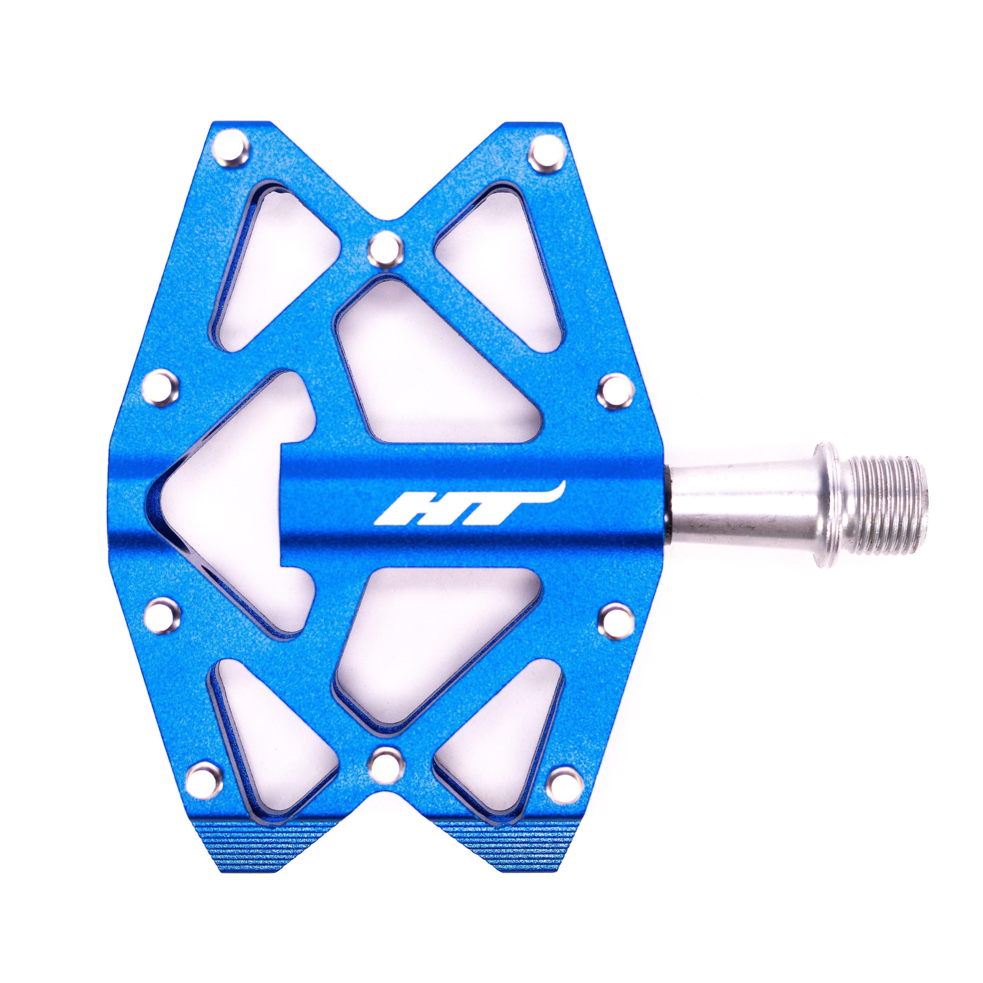 The HT AXO1A Nano Pedals are blue metal bicycle pedals with a triangular cut-out design, threaded spindle, and high-quality DU bushing, ideal for young riders seeking dependable performance against a white background.
