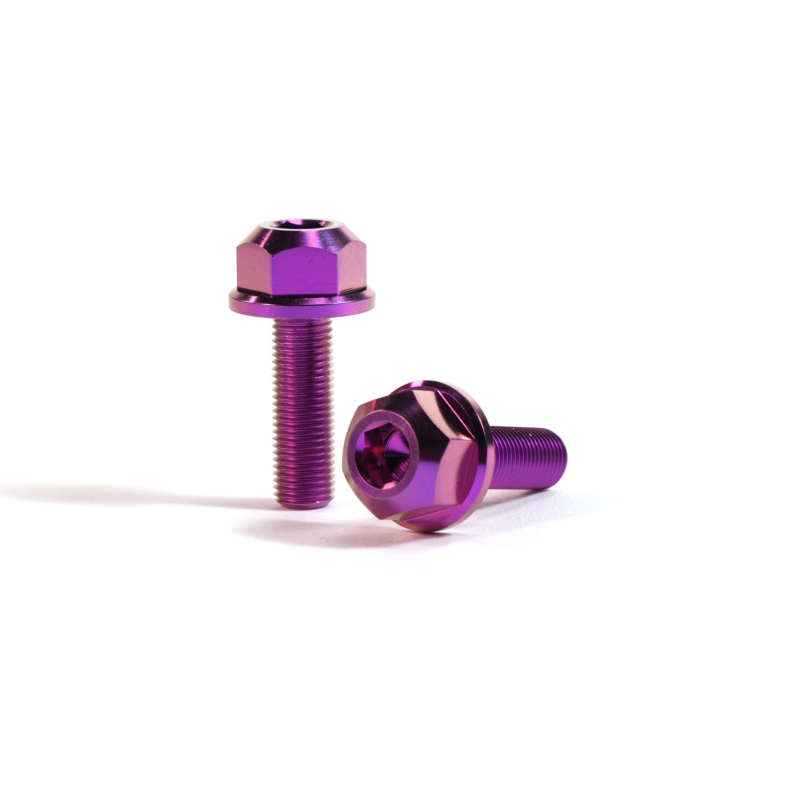 A pair of ION BMX Titanium GR5 Hex Axle Bolts—precision CNC-machined from Ti-6Al-4V (GR5) titanium with threads and flanged heads, metallic purple finish, designed for BMX applications and shown on a white background.