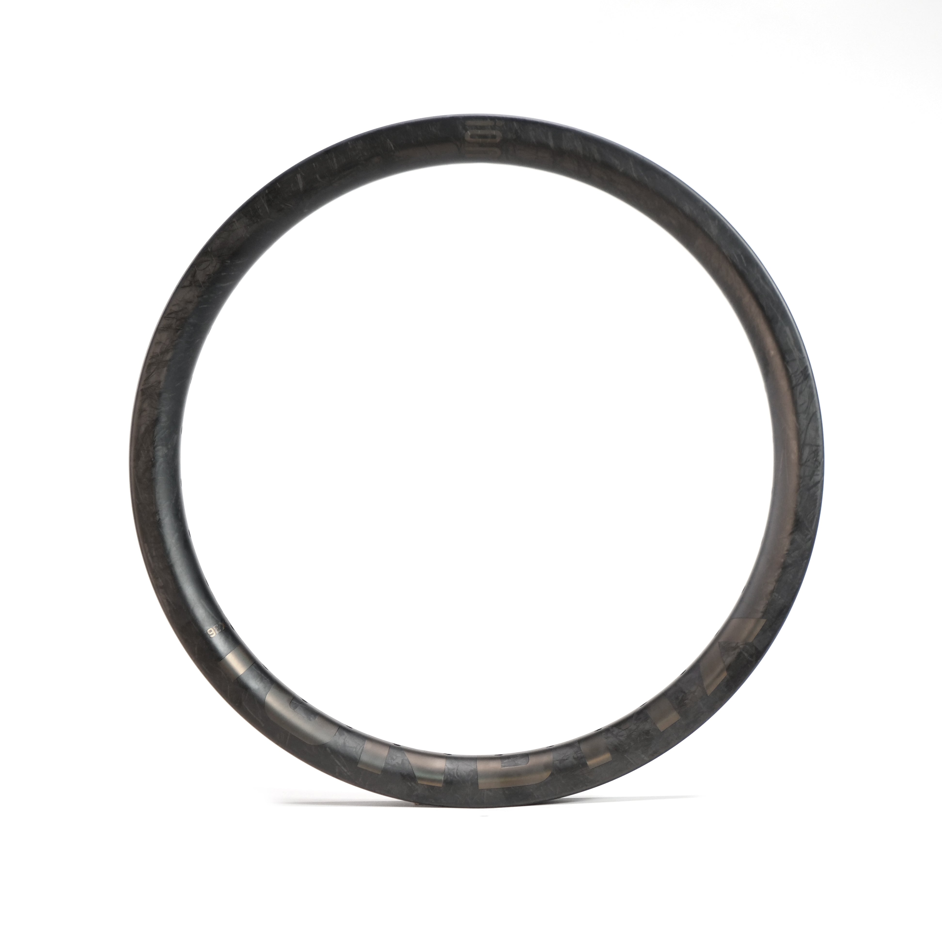The ION BMX C18 Carbon Fiber 18 Inch Brakeless Rim, made from Toray T800s carbon fiber, is displayed upright against a plain white background.