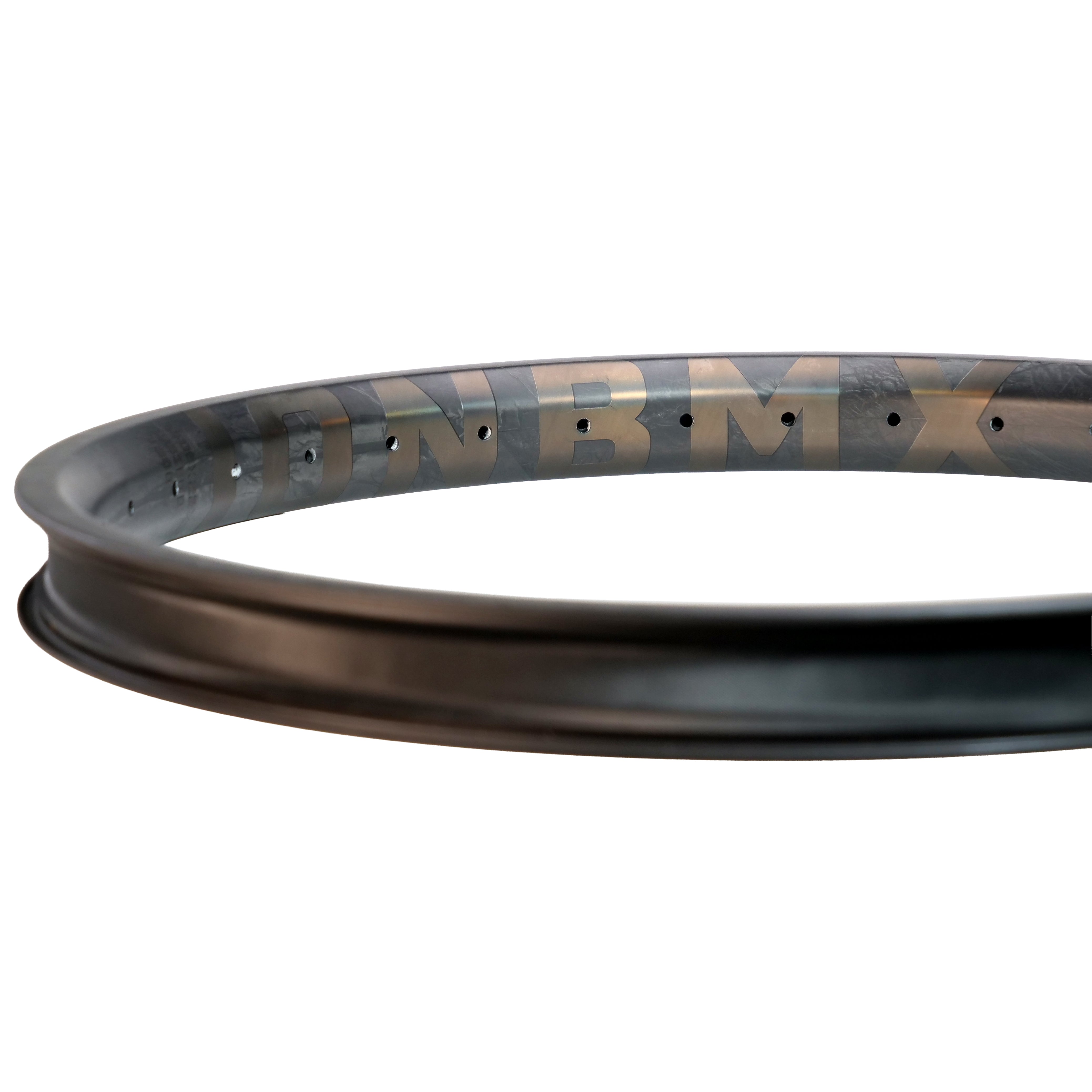 A close-up of the ION BMX C20 Carbon Fiber 20 Inch Brakeless Rim in black, featuring visible spoke holes and subtle inner lettering, highlights the strength and style of this top-tier BMX carbon rim.