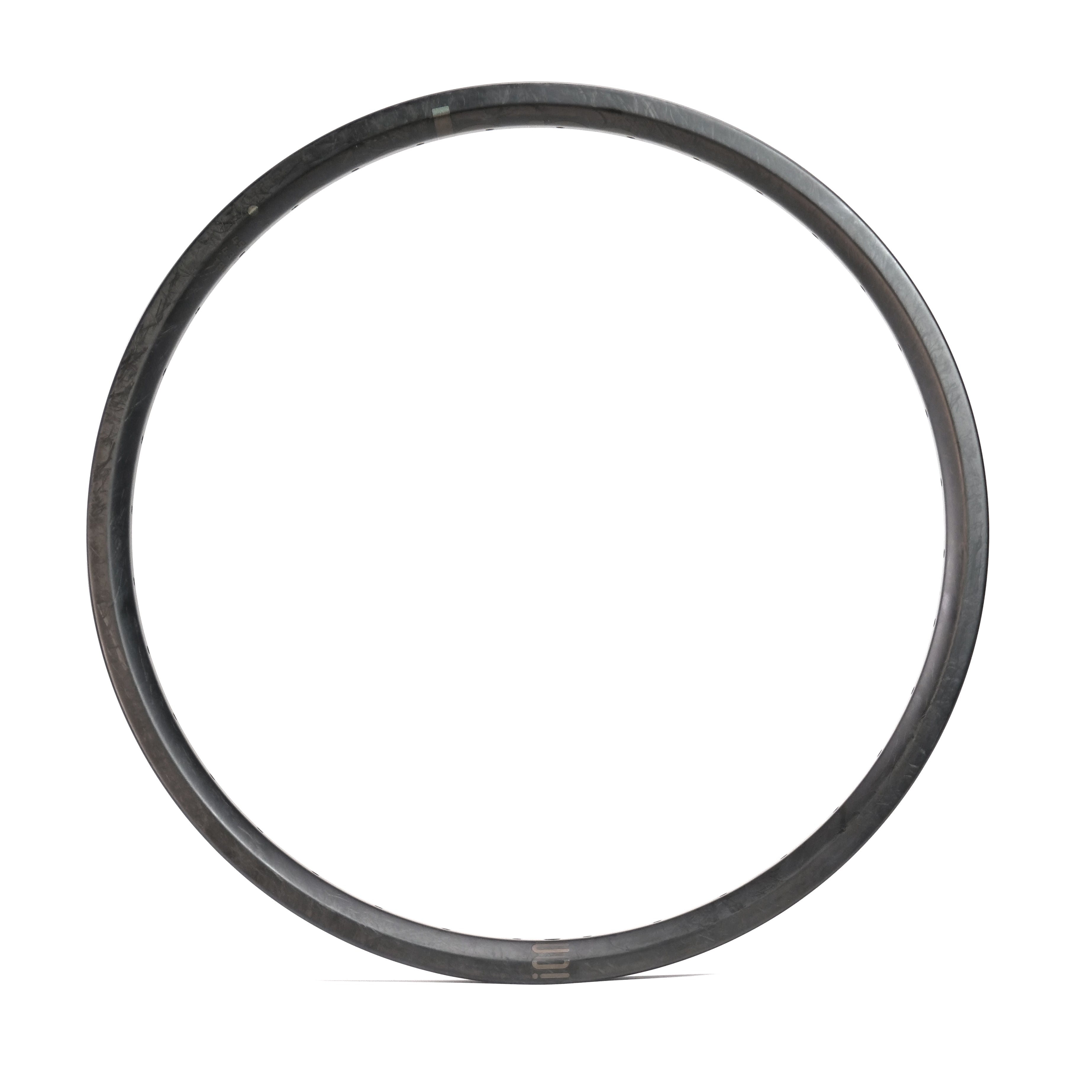 The ION BMX C22 Carbon Fiber 22 Inch Brakeless Rim is displayed against a white background, showcasing its sleek design and lightweight build ideal for 22" Freestyle BMX riding.