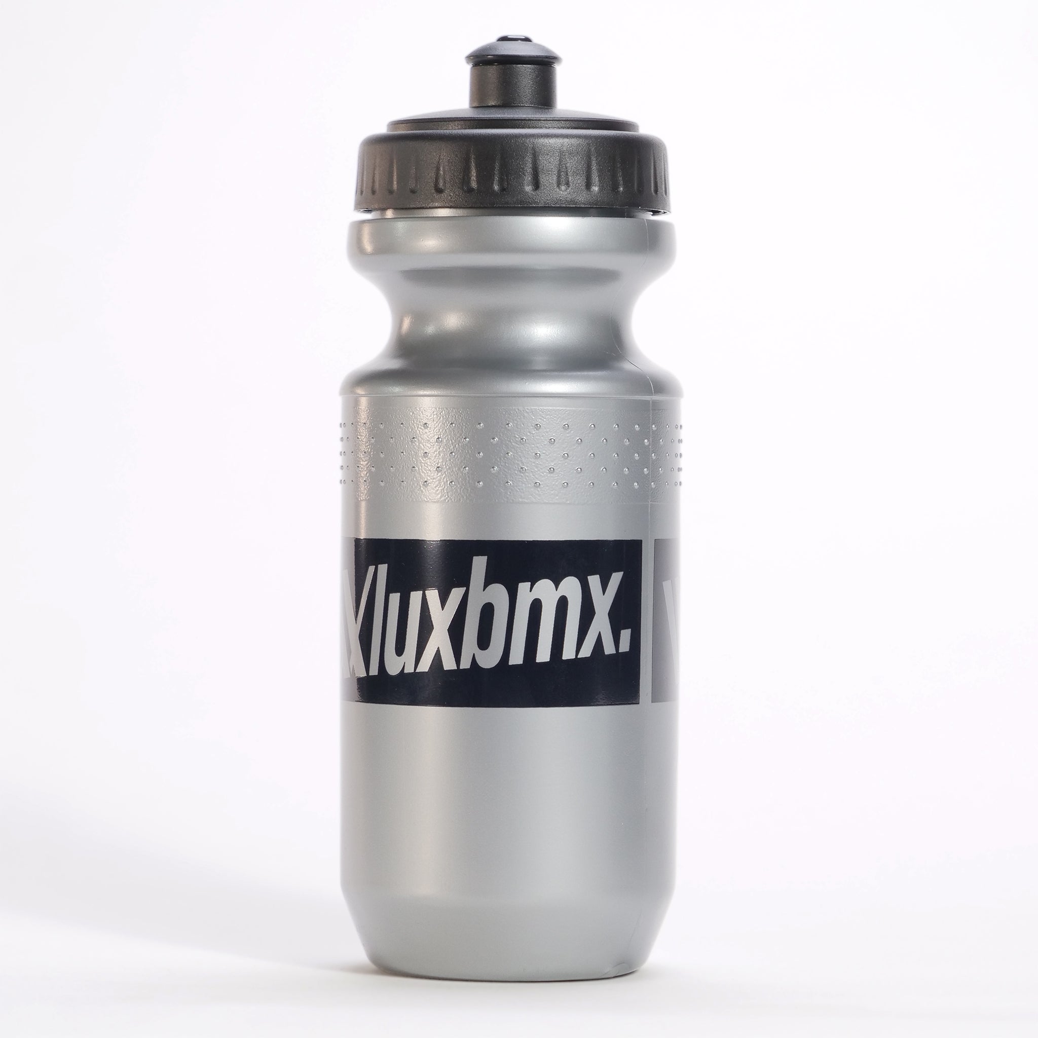 The LUXBMX Squirt Water Bottle 500ml in silver is made from BPA-free plastic, features a black screw-on lid and "Kluxbmx" text on the front, and stands upright on a white background.