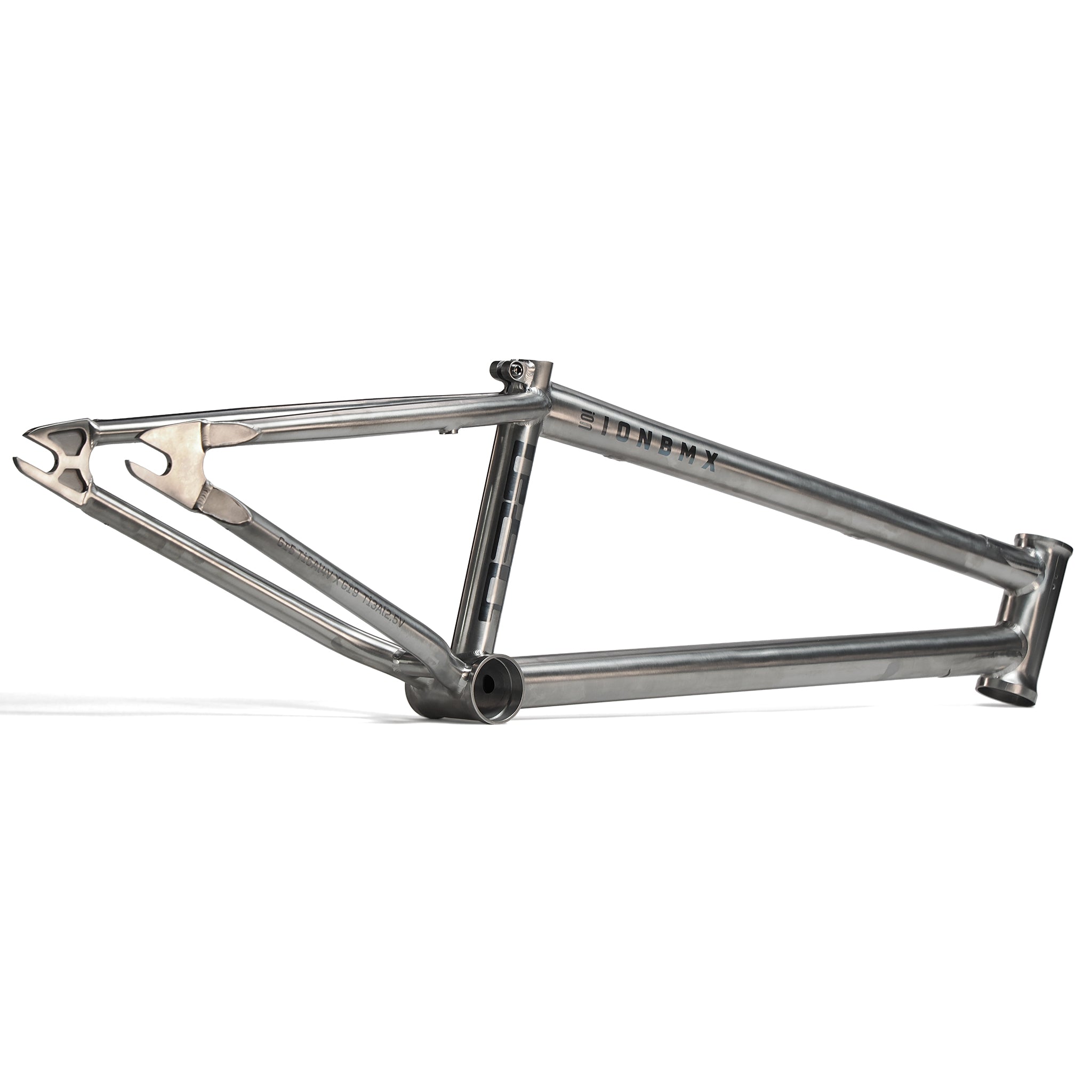 The ION BMX AMP20 Titanium 20 Inch Frame is a raw aerospace-grade titanium BMX frame with a side profile, showcasing its triangular welded structure and integrated seat and head tubes for high performance.