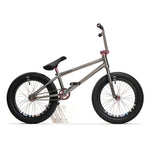 The ION BMX Ti18 Custom Titanium 18 Inch Bike, a lightweight freestyle model with black tires, black seat, and pink handlebar and fork accents, is displayed in side profile against a white background.