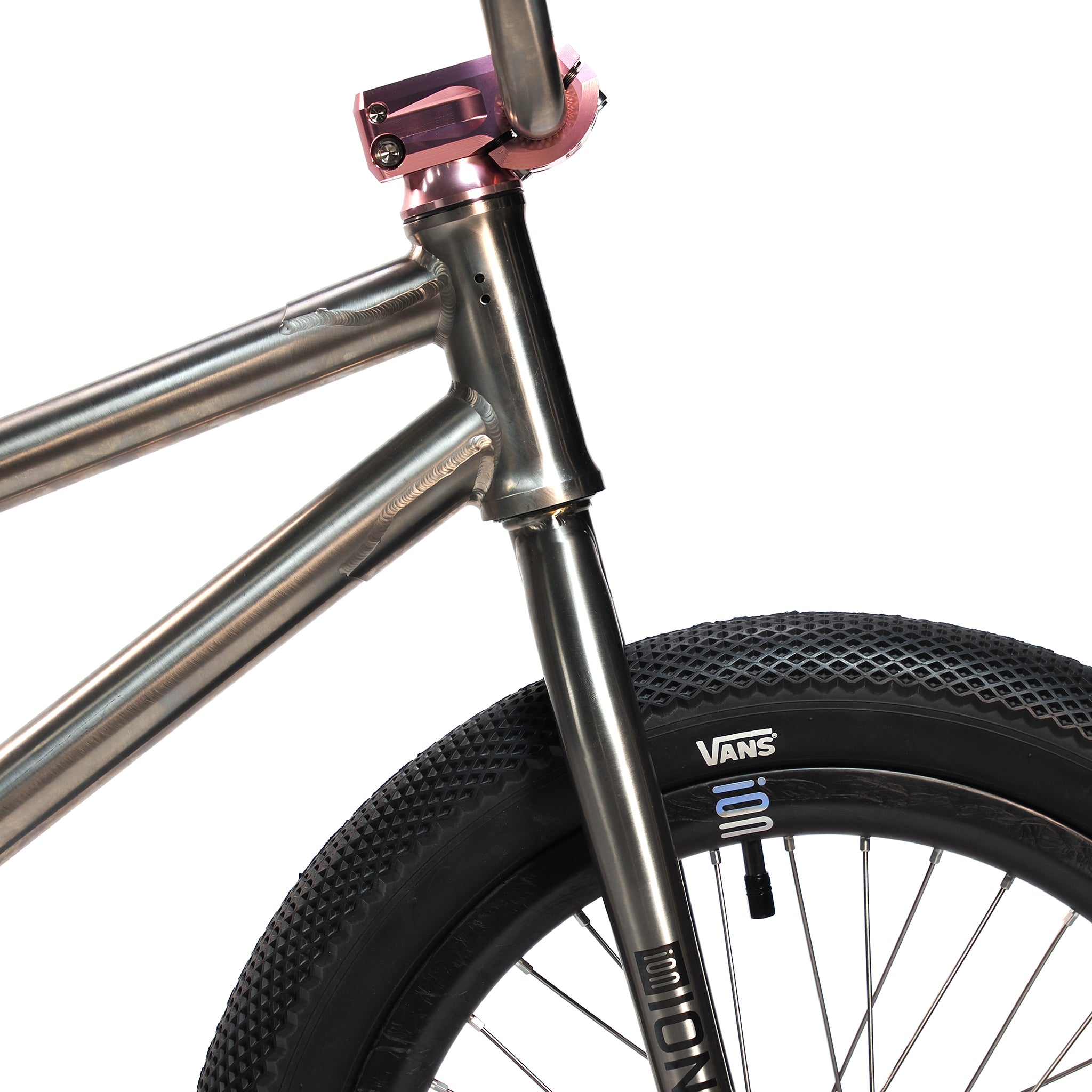 A close-up of the lightweight ION BMX Ti18 Custom Titanium 18 Inch Bike, highlighting its sleek design and durable titanium build tailored for freestyle BMX riding.