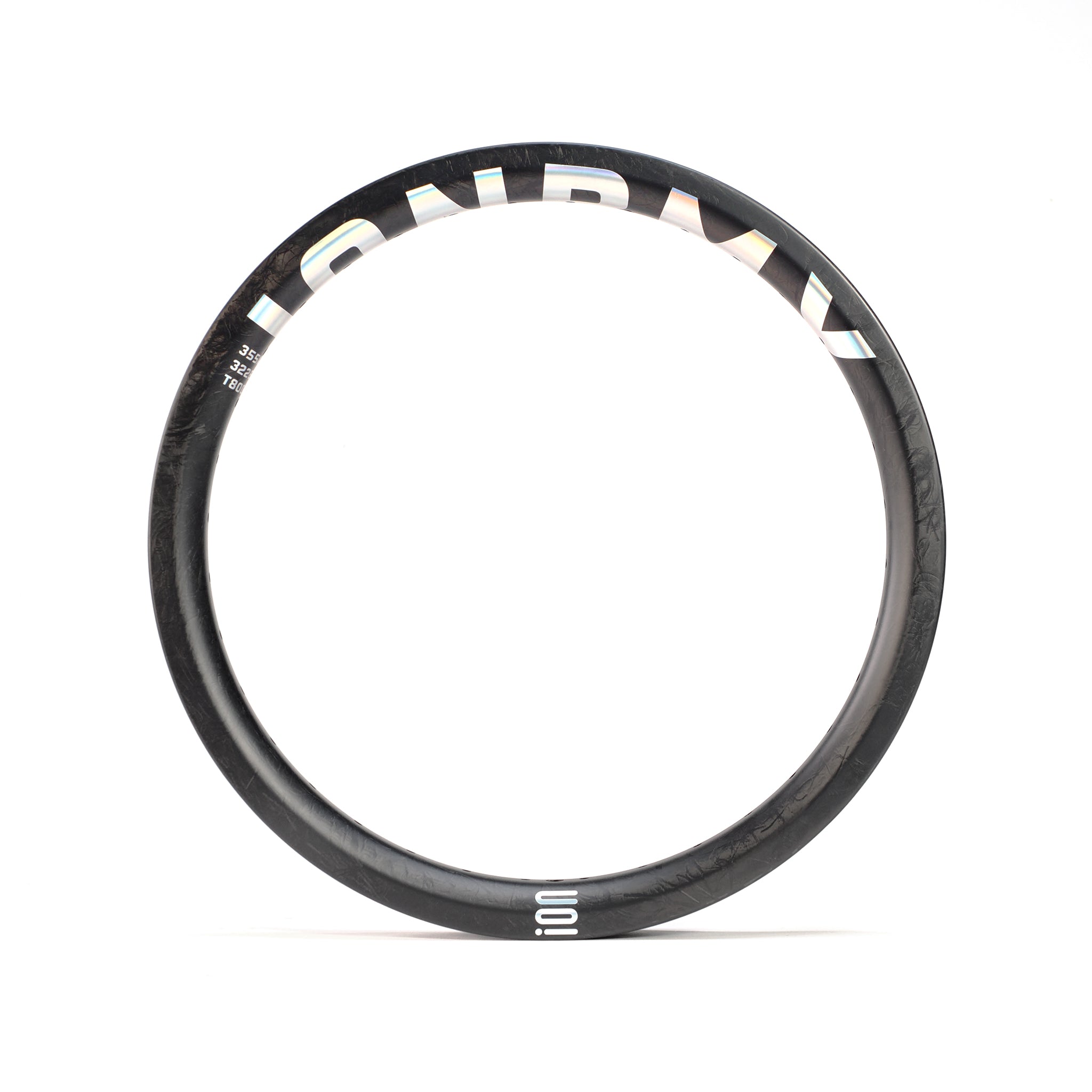 The ION BMX Carbon Fiber 18 Inch Brakeless Rim in black, crafted from Toray T800s with "ION BMX" branding, is shown upright against a white background.