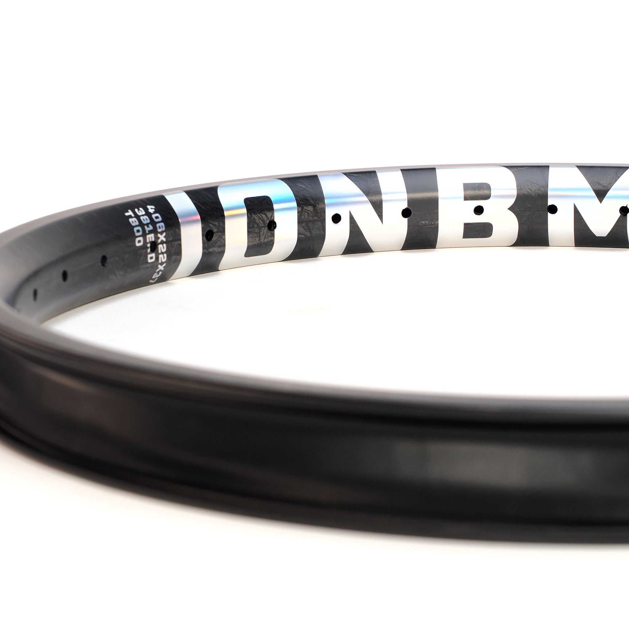 Close-up of the ION BMX C20 Carbon Fiber 20 Inch Brakeless Rim, featuring bold white lettering and specs on its durable Toray T800 carbon fiber, shown against a white background.