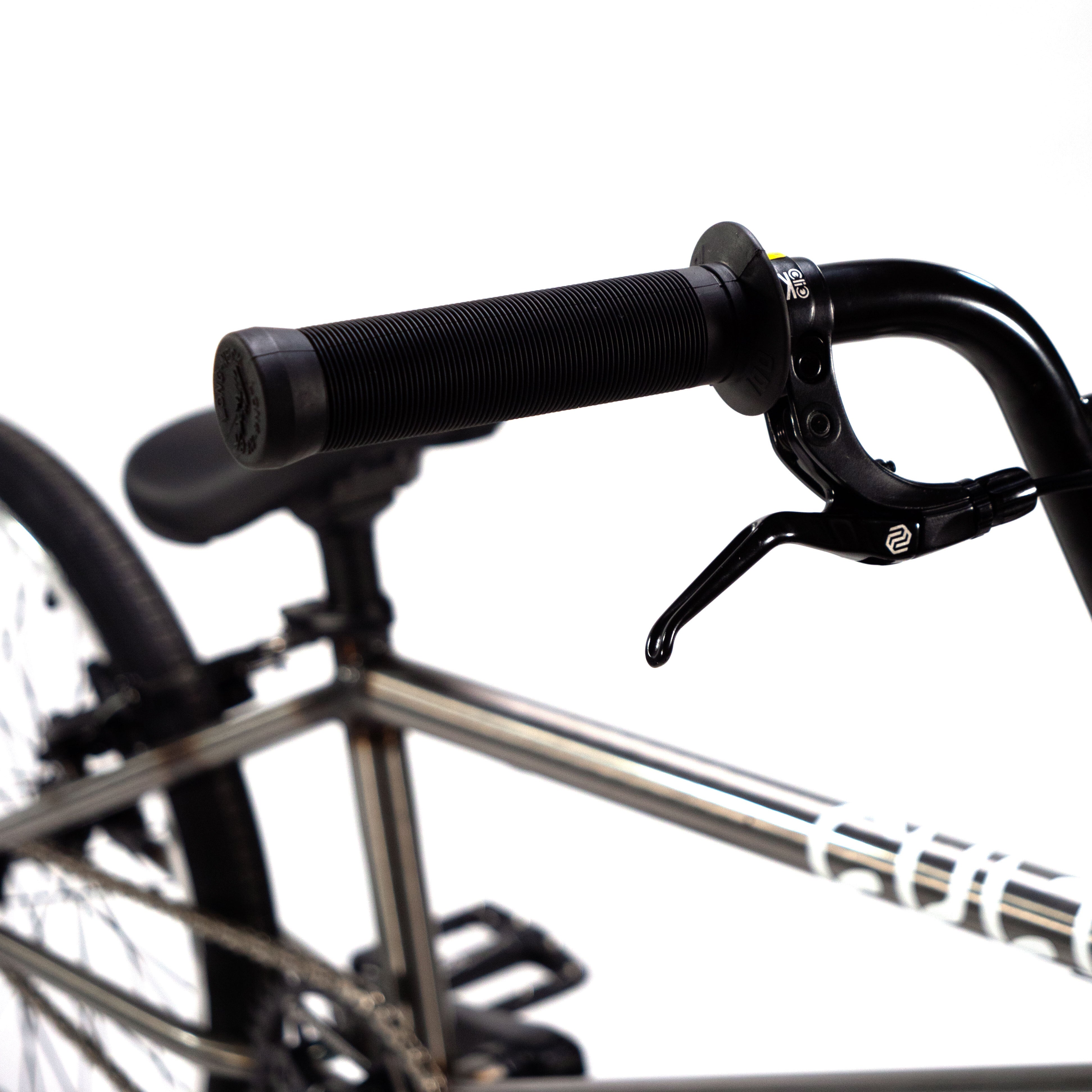 A close up of the handlebars of a Cult Vick Behm Custom Race Bike.