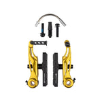 Gold-colored Promax P-1 Mini V Brake set, including brake arms, pads, bolts, rubber boots, and cable noodle, all displayed neatly on a white background.