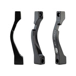 Three Promax PM for PM Disc Brake Adaptors (140/160, 140/180, 160/180) for post mount setups are shown from various angles on a white background; one is marked "20MM PM" with an arrow and logo, emphasizing its precise mounting hardware design.