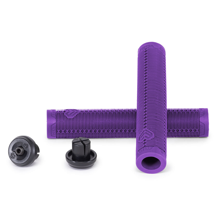 A pair of Eclat Shogun Grips in purple color on a white background is the given product name.