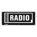 The Radio Contest Banner is a black and white PVC sign featuring "RADIO" in bold capitals, framed with a vertical bar pattern left border. Durable and weather-resistant, it’s perfect for outdoor events.