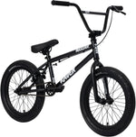 The Raven Trickster 18 Inch Bike is black, has thick tires, chromoly cranks, rear wheel pegs, and features "Trickster" and "Raven" on the frame.