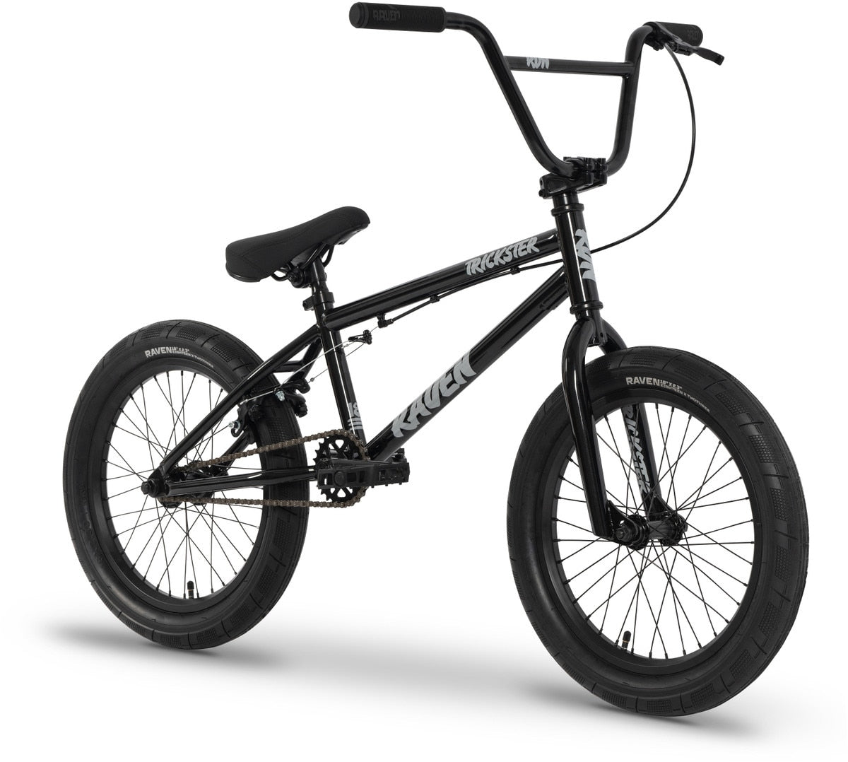 The Raven Trickster 18 Inch Bike, shown against a white background, features a black frame with thick tires, sealed bearing hubs, chromoly cranks, single gear, straight handlebars, and “Raven” and “Trickster” labels.