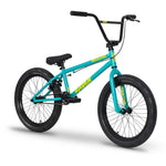 The Raven Trickster 20 Inch Bike is a teal and yellow entry-level BMX with black handlebars, seat, and tires, displayed against a white background.
