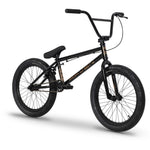 The Raven LC 20 Inch Bike features thick tires, upright handlebars, and a lightweight chromoly frame, displayed on a white background.