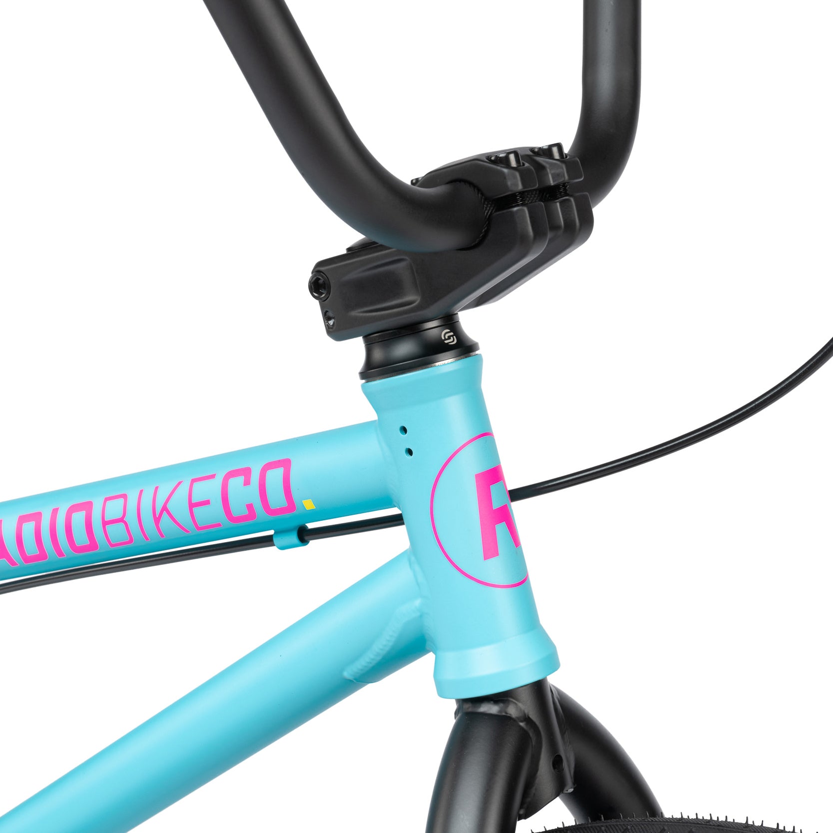 A Radio Evol 20 bike in blue and pink with a pink handlebar.