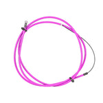 A coiled pink Salt Am Slick Brake Cable with black connectors and a small clear bulb at one end, featuring a poly-slip coated stainless slick inner cable for smooth performance.