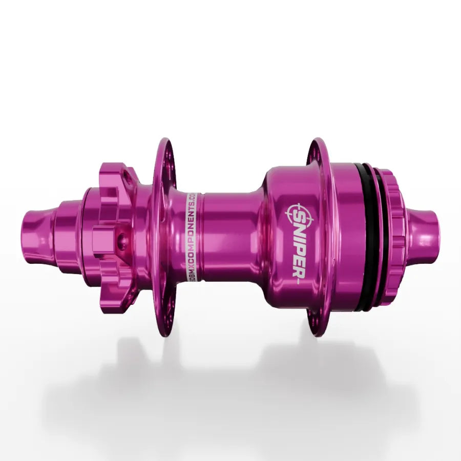The SD-X Sniper Evo Air Expert 10mm Rear Hub (28 Hole) in pink anodized finish is displayed on a white background.