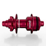 A close-up of the SD-X Sniper Evo Air Expert 10mm Rear Hub (36 Hole) in red anodized finish, displaying "SNIPER" branding and its lightweight racing hub design against a plain white background.