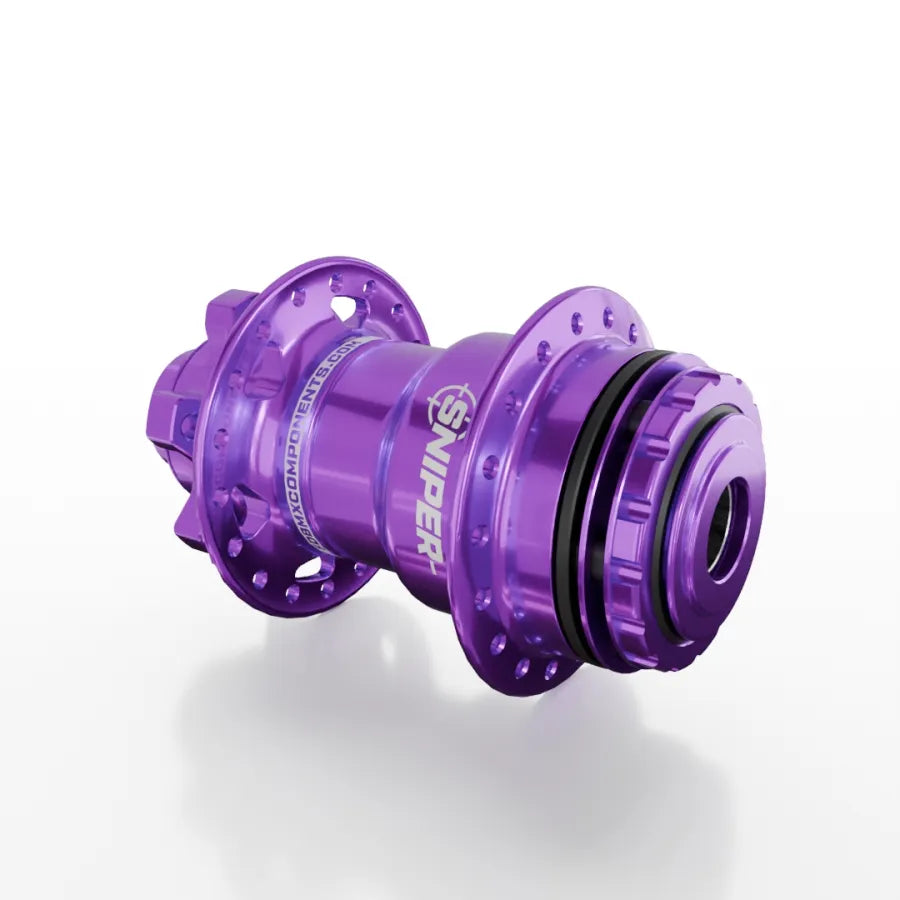 A purple SD-X Sniper Evo Pro 15mm Rear Hub (36 Hole) made from durable 7075 aluminium, featuring multiple spoke holes and displayed on a white background.