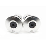 Two Salt Plus HQ Handlebar Plugs with knurled grips and hexagonal sockets, positioned side by side. Each screw has "6061-T6" engraved on the head.
