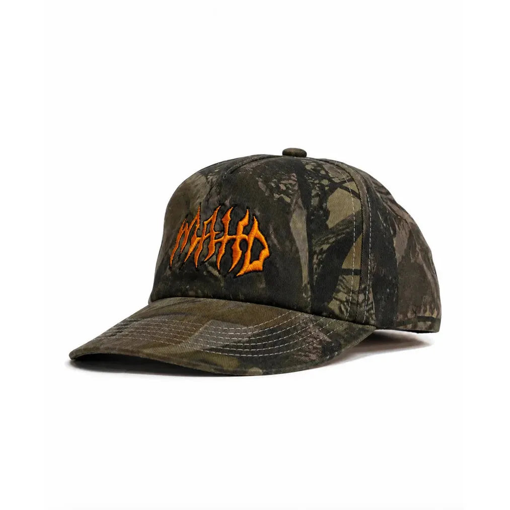 A Mahd - Metal Hat, featuring a camouflage 5 Panel design with orange embroidered text in a stylized font on the front, displayed against a white background.