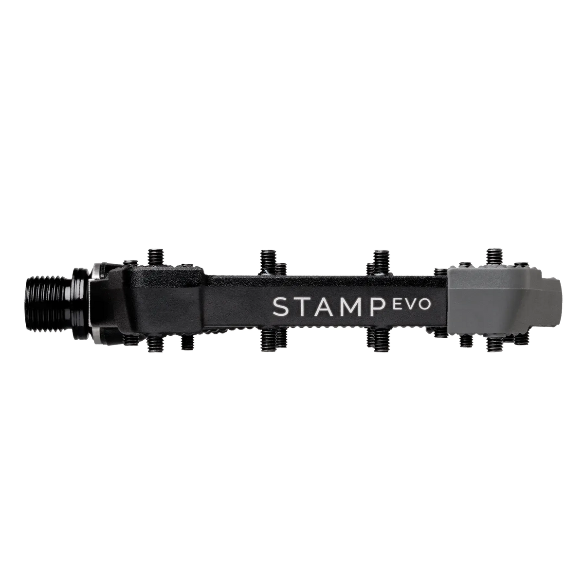 Side profile of black Crankbrothers Stamp Evo Pedals (Large) with adjustable pins, a large platform, and “STAMP EVO” text on the side.