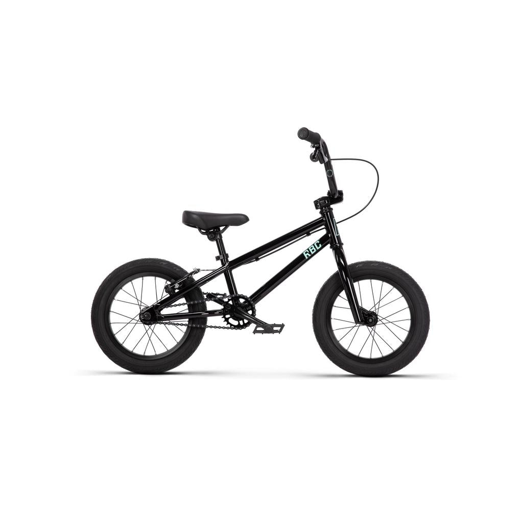 The Radio Revo 14 Inch bike, shown in profile on a white background, is a black BMX kids’ bike with 14-inch wheels, padded seat, and front and rear hand brakes—ideal as a first bike.