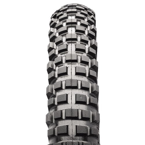 Close-up of the Maxxis Creepy Crawler 20 (19 inch rim) Trials Tyre (not for BMX) viewed from above, showcasing its distinctive knobby tread pattern and rubber texture.