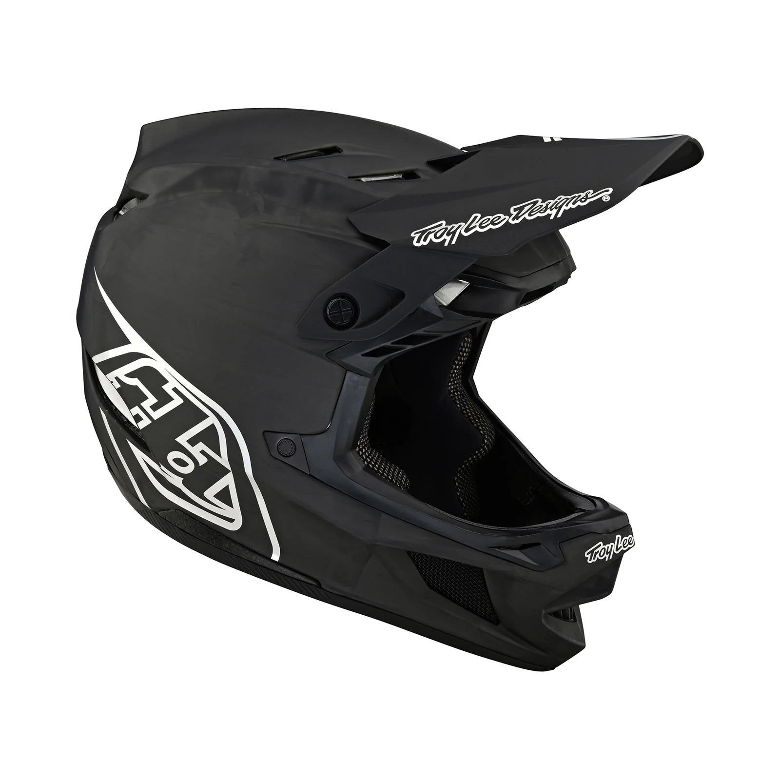 A TLD D4 AS Carbon W/MIPS Helmet Black/Silver with a white logo and MIPS Brain Protection System.