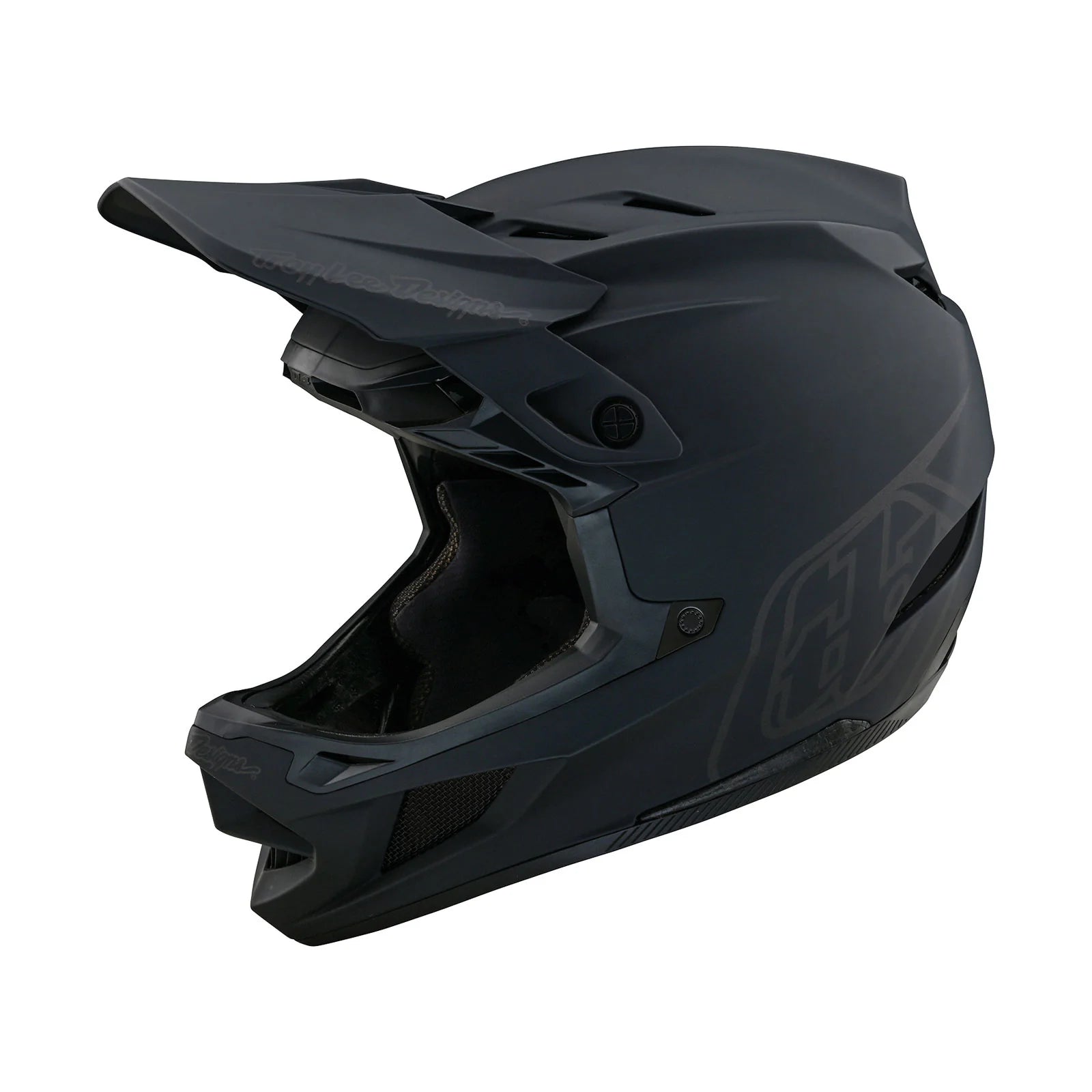 A TLD D4 AS Polyacrylite Helmet W/MIPS Stealth Black on a white background.